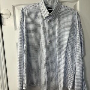 White long sleeve shirt with blue check.